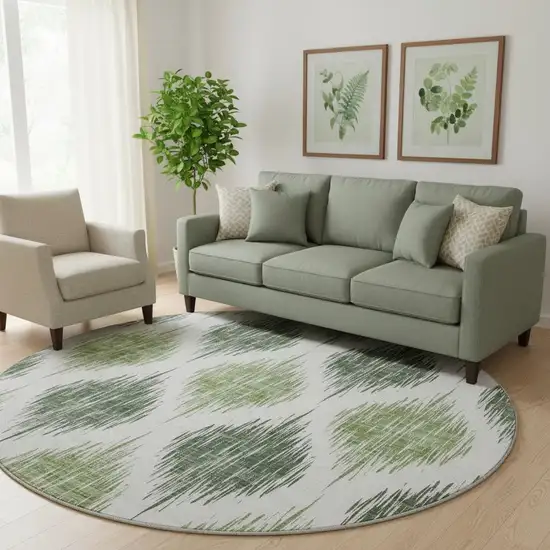 8' Fern Green And Ivory Ikat Washable Round Rug With UV Protection Photo 1