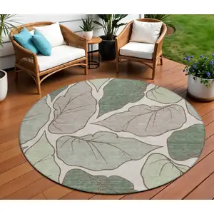 Photo of 8' Fern Green And Ivory Round Botanical Leaves Washable Indoor Outdoor Area Rug