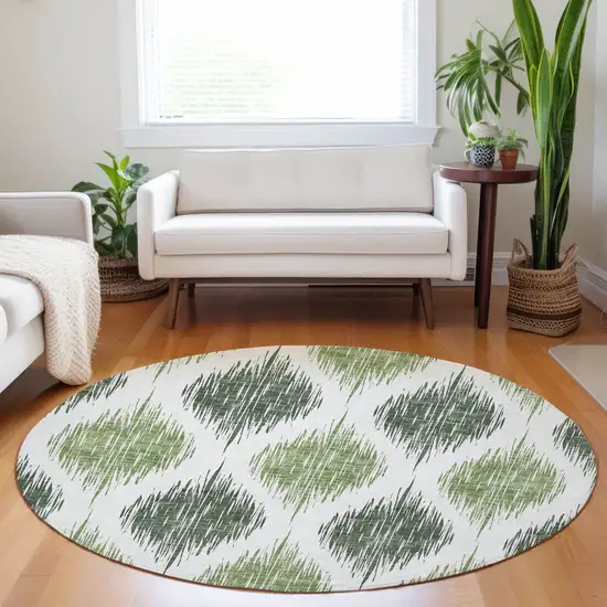 8' Fern Green And Ivory Round Ikat Washable Indoor Outdoor Area Rug Photo 7