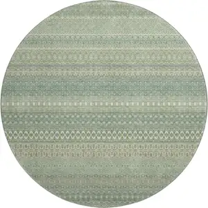 Photo of 8' Fern Green And Ivory Striped Washable Round Rug With UV Protection