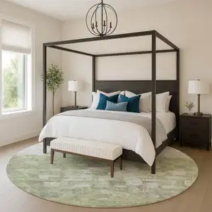 Photo of 8' Fern Green And Silver Abstract Washable Round Rug With UV Protection