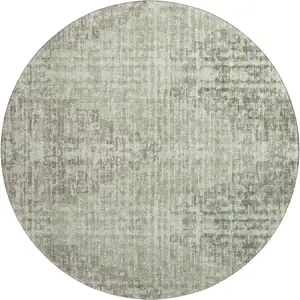 Photo of 8' Fern Green And Taupe Geometric Washable Round Rug With UV Protection