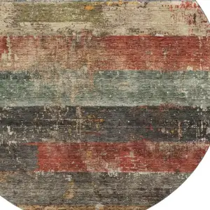 Photo of 8' Fern Green Blue And Red Striped Washable Round Rug With UV Protection