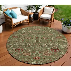 Photo of 8' Fern Green Brown And Red Round Floral Washable Indoor Outdoor Area Rug