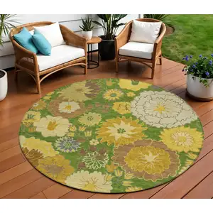 Photo of 8' Fern Green Gold And Beige Round Floral Washable Indoor Outdoor Area Rug