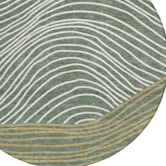 8' Fern Green Ivory And Gold Round Striped Washable Indoor Outdoor Area Rug Photo 7