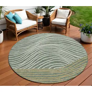 Photo of 8' Fern Green Ivory And Gold Round Striped Washable Indoor Outdoor Area Rug