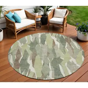 Photo of 8' Fern Green Tan And Ivory Round Striped Washable Indoor Outdoor Area Rug