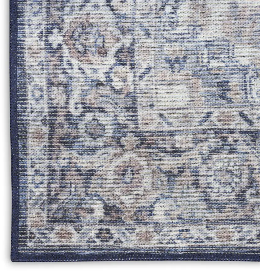 10' Blue and Ivory Floral Power Loom Distressed Washable Runner Rug Photo 9