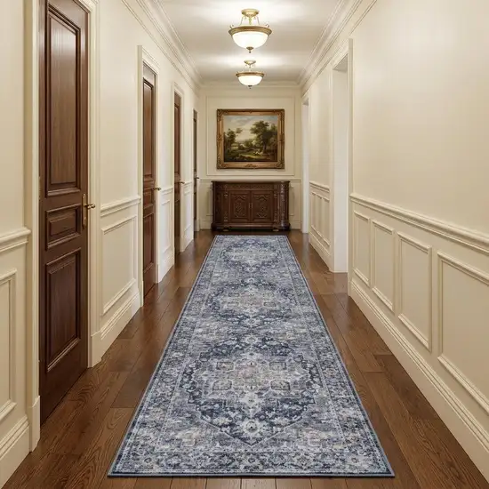 10' Blue and Ivory Floral Power Loom Distressed Washable Runner Rug Photo 1