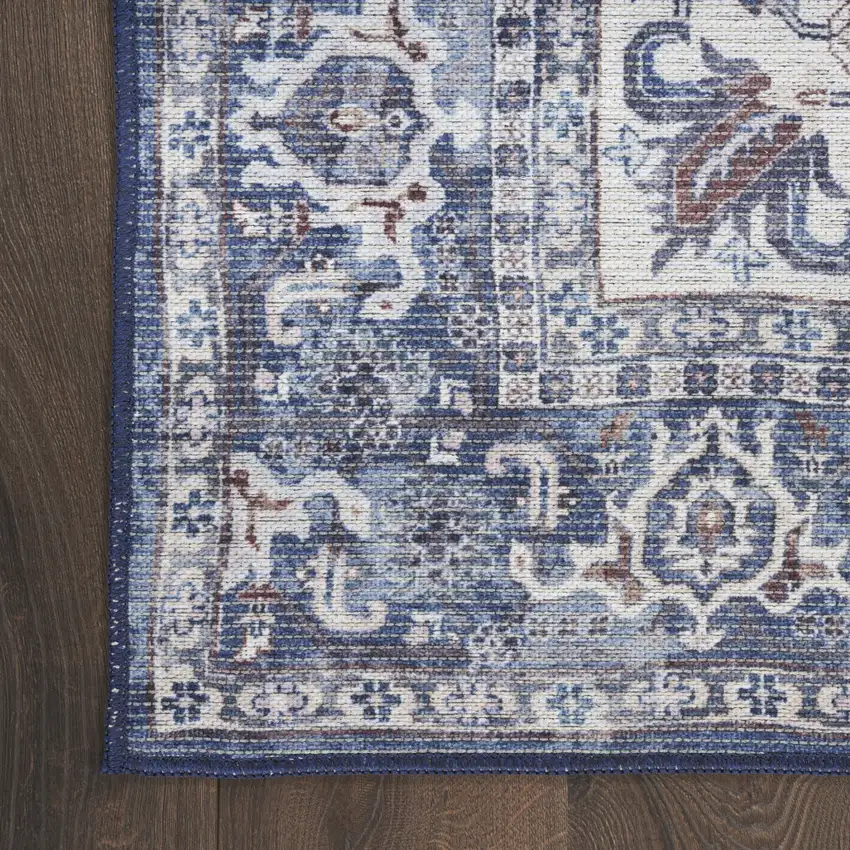 10' Blue and Ivory Floral Power Loom Distressed Washable Runner Rug Photo 7
