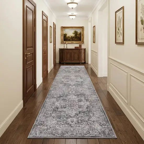 10' Gray and Ivory Floral Power Loom Distressed Washable Runner Rug Photo 1