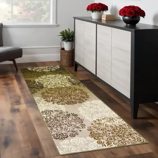 8' Brown Green And Ivory Floral Medallion Washable Runner Rug Photo 1