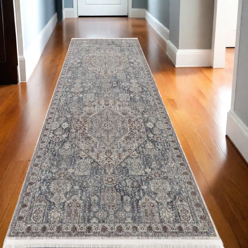 10' Blue and Ivory Floral Power Loom Runner Rug With Fringe Photo 1