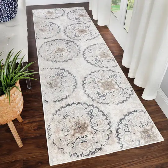 8' Ivory Geometric Medallion Stain Resistant Runner Rug Photo 7