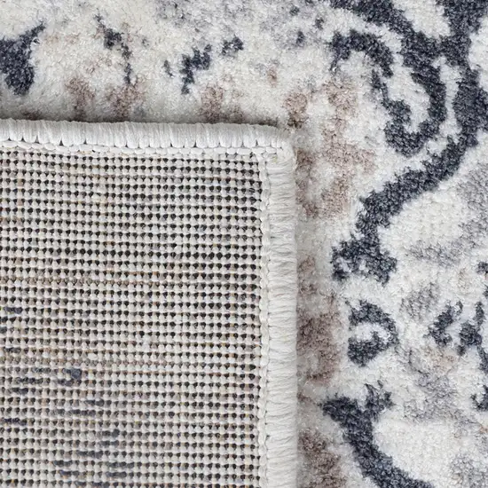 8' Ivory Geometric Medallion Stain Resistant Runner Rug Photo 8