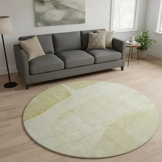 8' Gold And Beige Abstract Washable Round Rug With UV Protection Photo 2