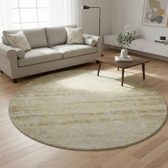 8' Gold And Beige Abstract Washable Round Rug With UV Protection Photo 2