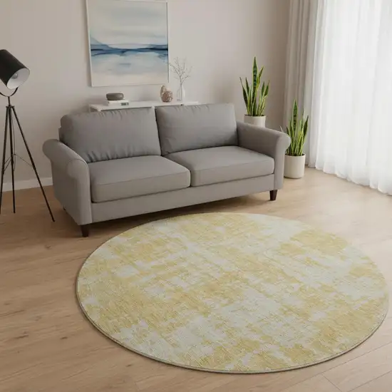 8' Gold And Beige Abstract Washable Round Rug With UV Protection Photo 2