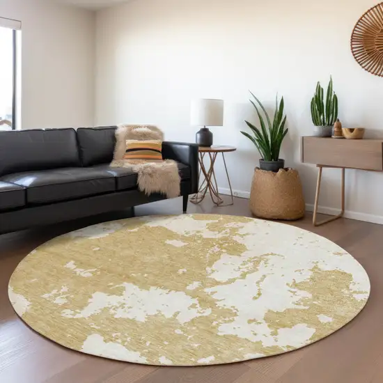 8' Gold And Beige Abstract Washable Round Rug With UV Protection Photo 4