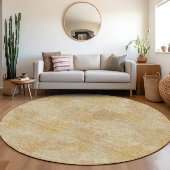 8' Gold And Beige Abstract Washable Round Rug With UV Protection Photo 4