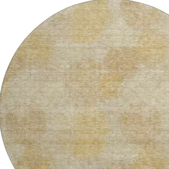 8' Gold And Beige Abstract Washable Round Rug With UV Protection Photo 2