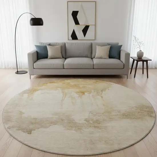 8' Gold And Beige Abstract Washable Round Rug With UV Protection Photo 2
