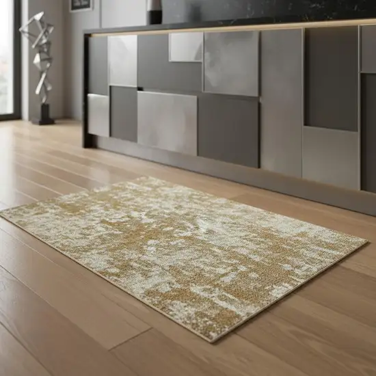 5' Gold And Beige Abstract Washable Round Rug With UV Protection Photo 1