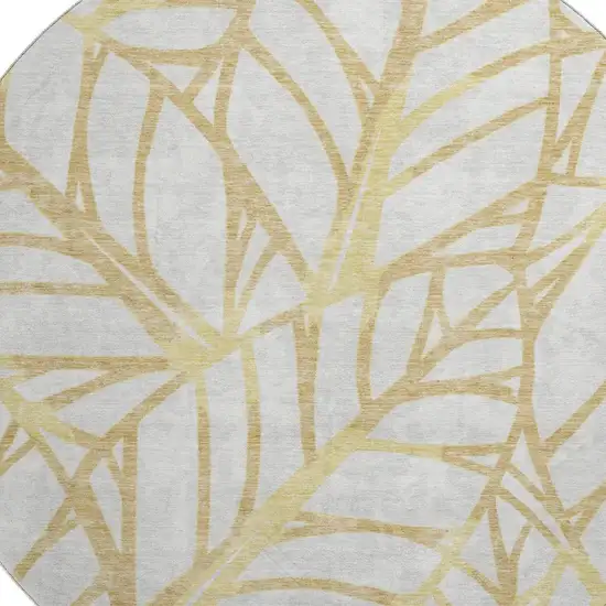 8' Gold And Beige Floral Washable Round Rug With UV Protection Photo 3