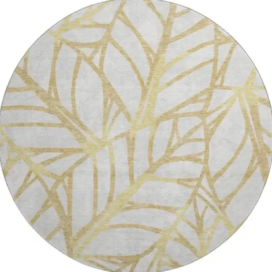 8' Gold And Beige Floral Washable Round Rug With UV Protection Photo 4