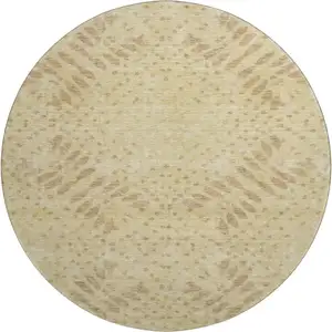 Photo of 8' Gold And Beige Floral Washable Round Rug With UV Protection