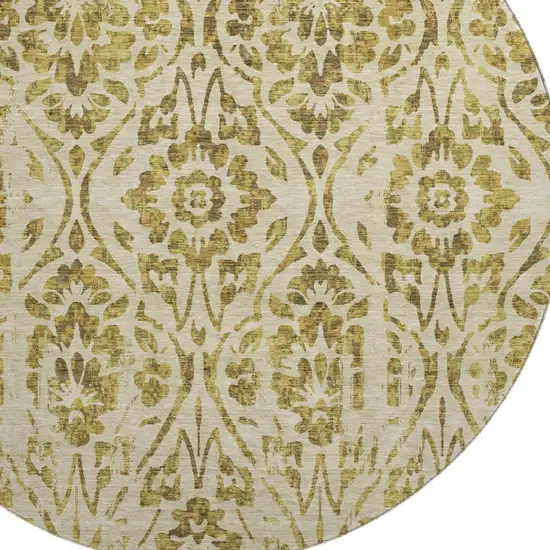 8' Gold And Beige Floral Washable Round Rug With UV Protection Photo 3