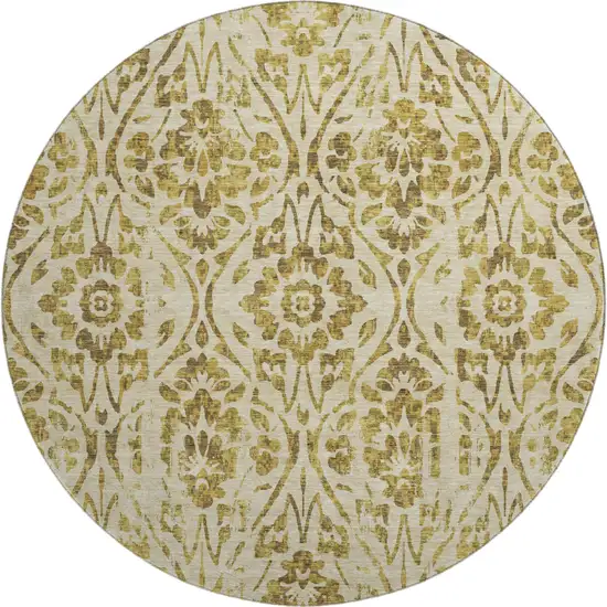 8' Gold And Beige Floral Washable Round Rug With UV Protection Photo 1