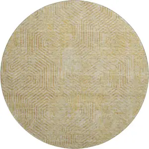 Photo of 8' Gold And Beige Geometric Washable Round Rug With UV Protection