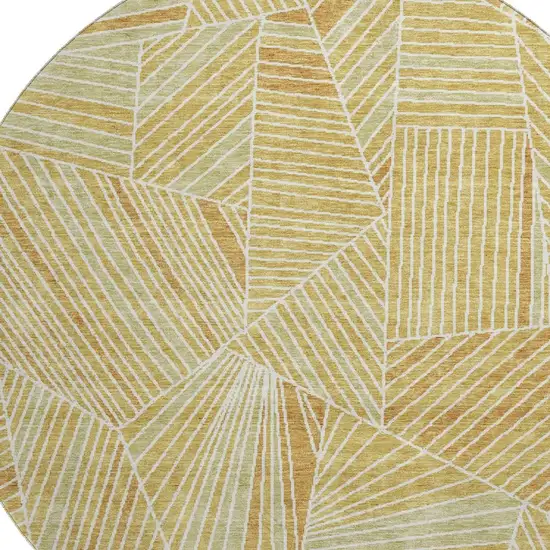 8' Gold And Beige Geometric Washable Round Rug With UV Protection Photo 3