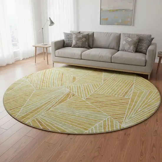8' Gold And Beige Geometric Washable Round Rug With UV Protection Photo 2