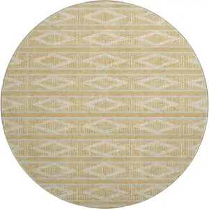 Photo of 8' Gold And Beige Geometric Washable Round Rug With UV Protection