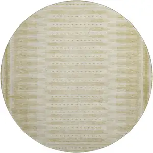 Photo of 8' Gold And Beige Geometric Washable Round Rug With UV Protection