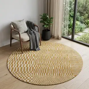 Photo of 5' Gold And Beige Geometric Washable Round Rug With UV Protection