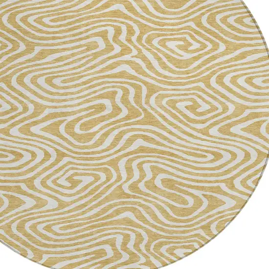 8' Gold And Beige Round Abstract Washable Indoor Outdoor Area Rug Photo 5