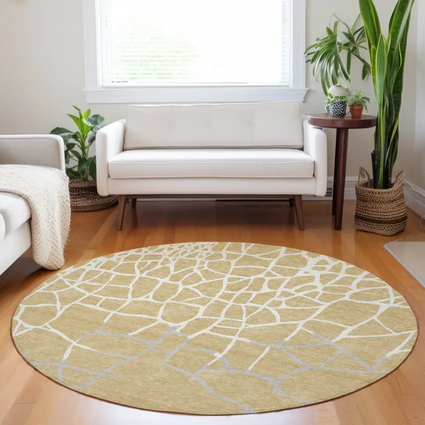 8' Gold And Beige Round Abstract Washable Indoor Outdoor Area Rug Photo 7