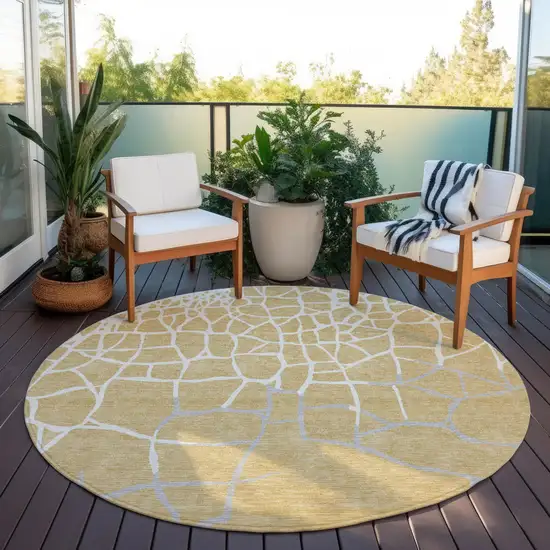 8' Gold And Beige Round Abstract Washable Indoor Outdoor Area Rug Photo 6