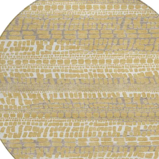 8' Gold And Beige Round Abstract Washable Indoor Outdoor Area Rug Photo 2