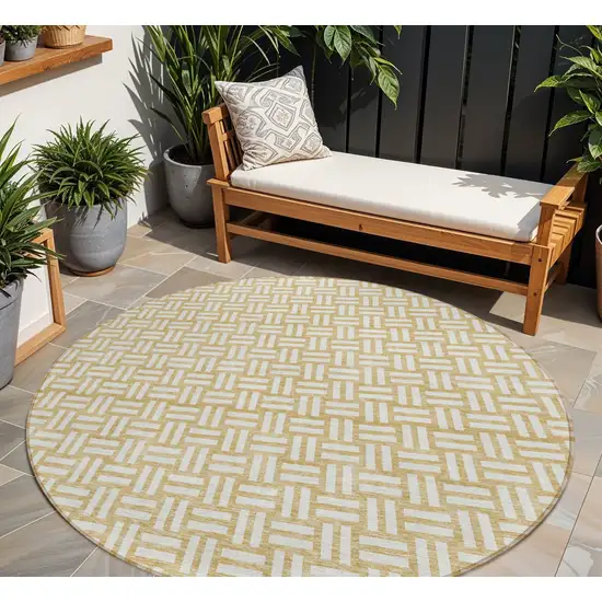 8' Gold And Beige Round Geometric Washable Indoor Outdoor Area Rug Photo 1