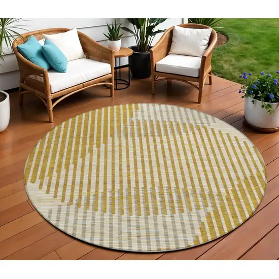 8' Gold And Beige Round Geometric Washable Indoor Outdoor Area Rug Photo 1