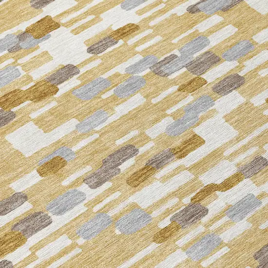 8' Gold And Beige Round Geometric Washable Indoor Outdoor Area Rug Photo 5