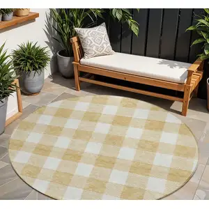 Photo of 8' Gold And Beige Round Plaid Washable Indoor Outdoor Area Rug