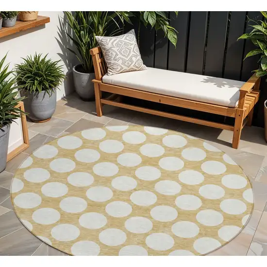 8' Gold And Beige Round Polka Dot Washable Indoor Outdoor Area Rug Photo 1
