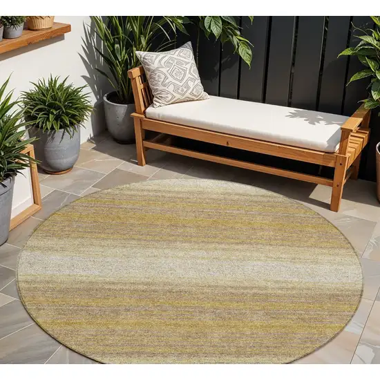 8' Gold And Beige Round Striped Washable Indoor Outdoor Area Rug Photo 1