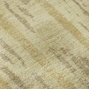 Photo of 8' Gold And Beige Striped Washable Round Rug With UV Protection